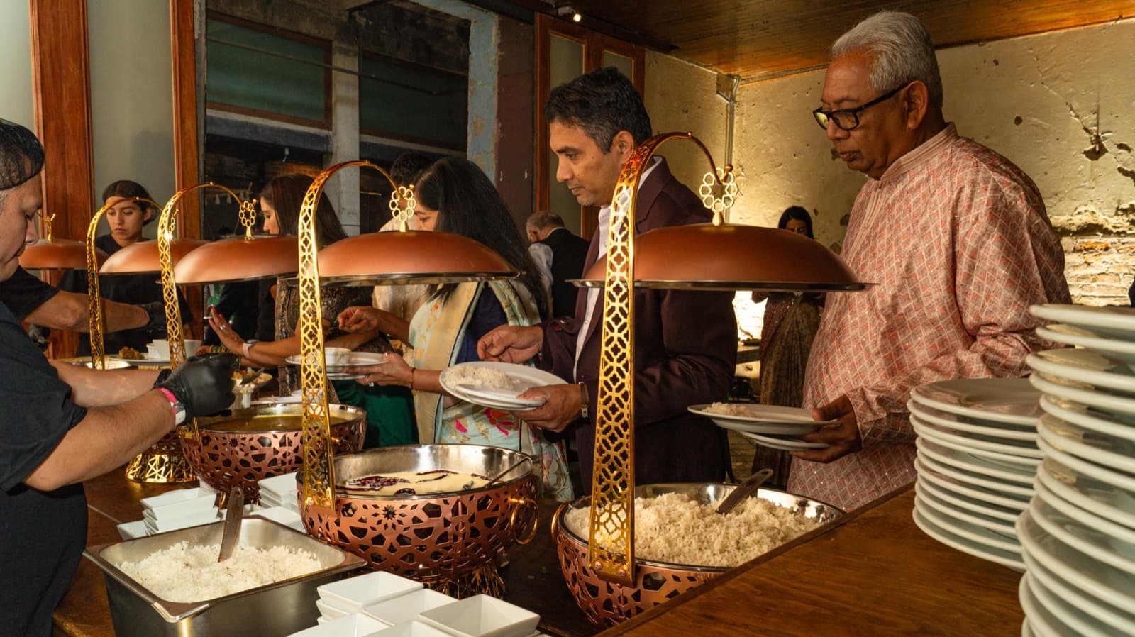 Grand Indian wedding buffet with copper serving vessels